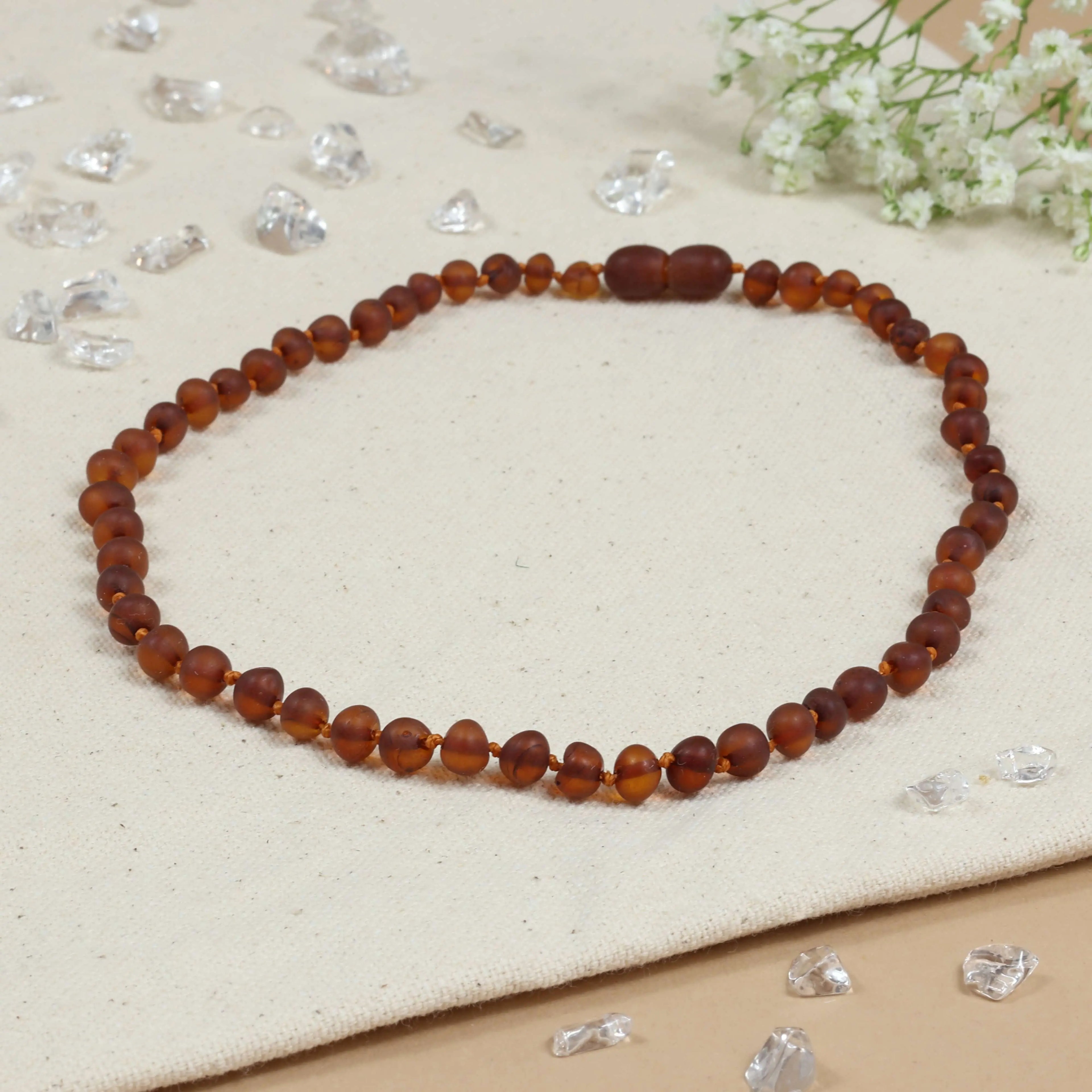 Barnsteen ketting baby/peuter cognac - unpolished